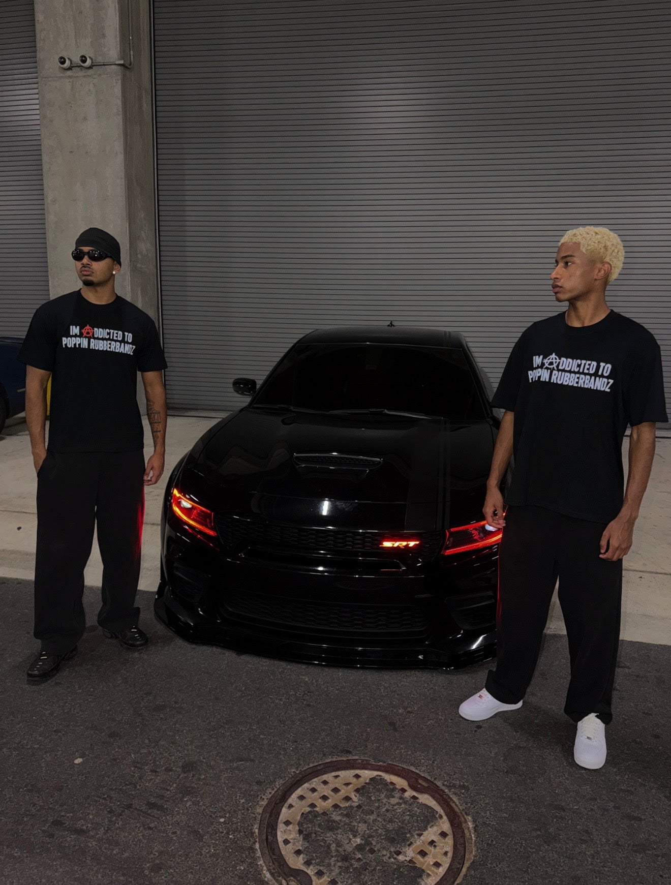“ADDICTED TO POPPIN RUBBERBANDZ “ TEE